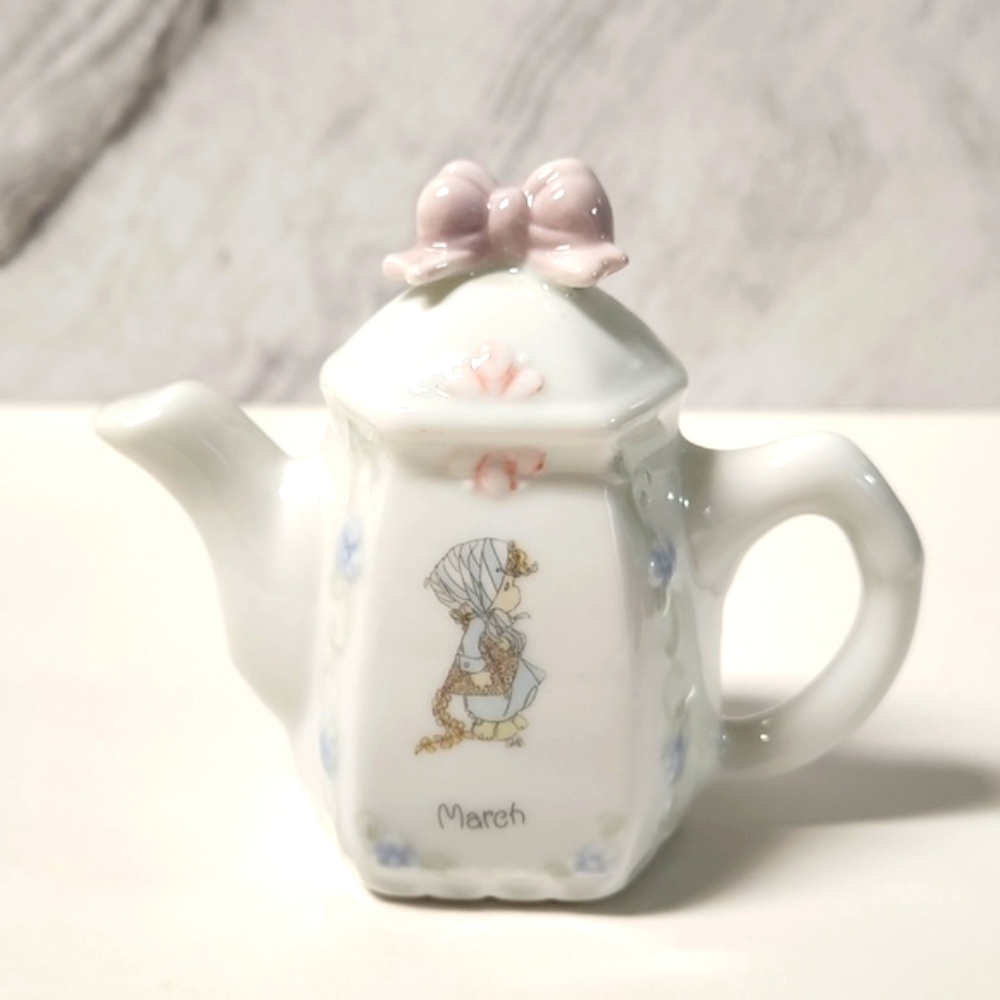 Precious moments March teapot figurine